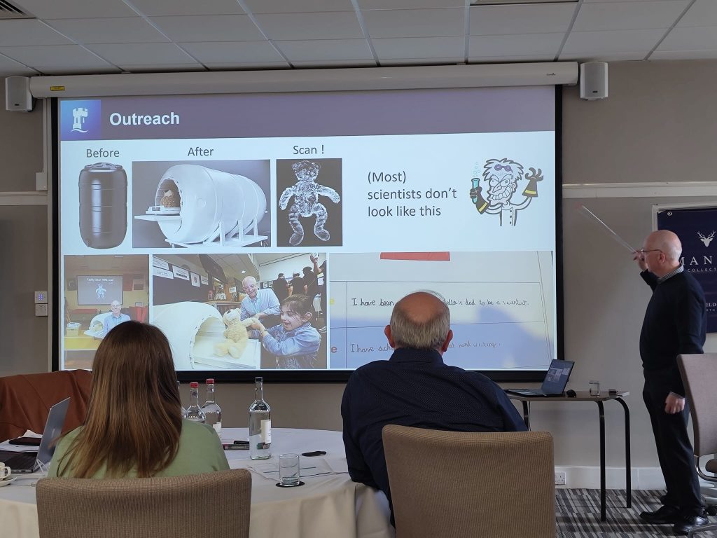 Presentation slide titled 'Outreach' shown during a Medical Imaging CDT event